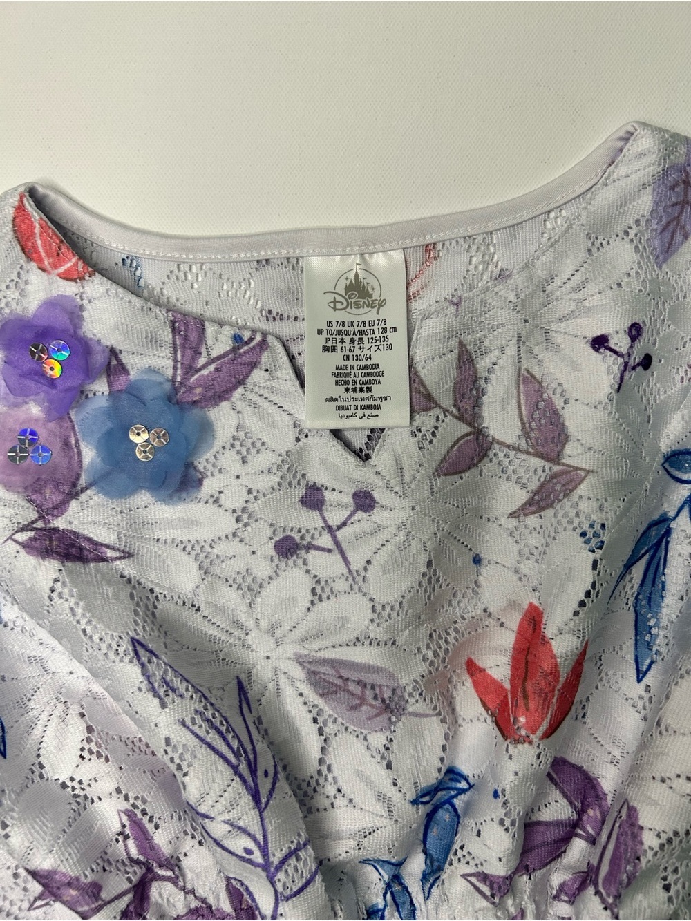 Disney White Eyelet Top with Purple, Blue & Coral Floral Accents Kaftan sleeves - Picture 2 of 9